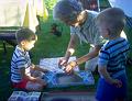 0320-Kenneth, Betty, John, playing Chutes and Ladders
